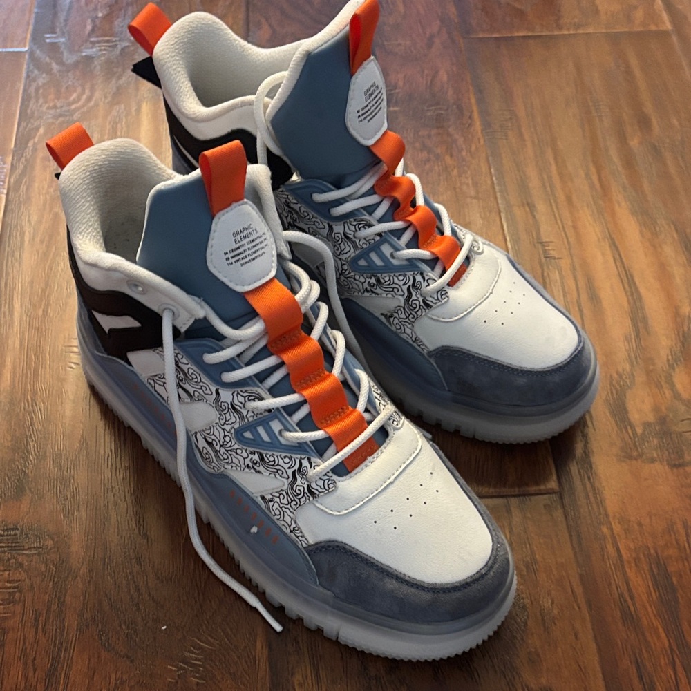 Stylish Athletic Shoes with Orange and Blue Accents